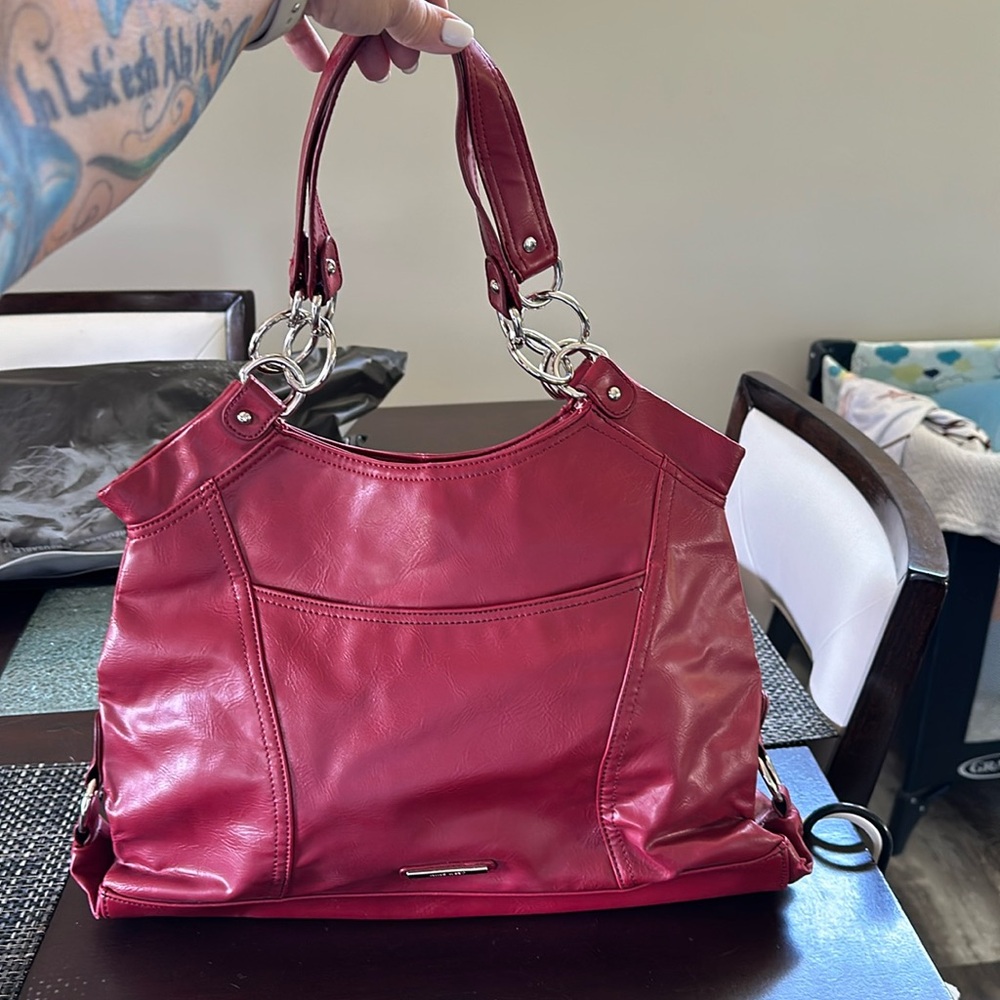 NWOT Nine West shoulder bag in a beautiful red color with silver hardware.